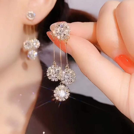 Boucles d'oreilles pétales rondes en zircon