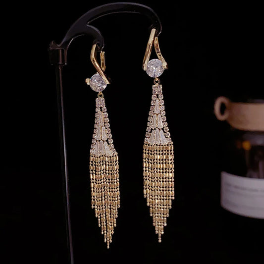 Boucles d'oreilles avec pattes en zircon