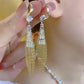 Boucles d'oreilles avec pattes en zircon