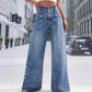 Jean taille haute à jambes larges et fentes latérales pour femme